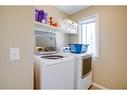 24 Copperstone Place Se, Calgary, AB  - Indoor Photo Showing Laundry Room 