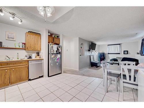 5220 19 Avenue Nw, Calgary, AB - Indoor Photo Showing Kitchen With Double Sink