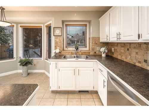 158 Sundown Place Se, Calgary, AB - Indoor Photo Showing Kitchen With Double Sink