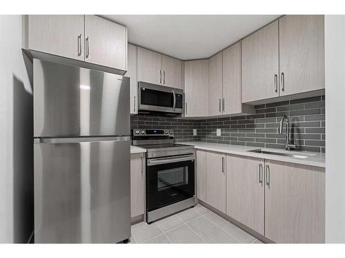 529 Corner Meadows Way Ne, Calgary, AB - Indoor Photo Showing Kitchen With Stainless Steel Kitchen