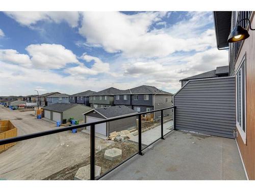 202-335 Creekside Boulevard, Calgary, AB - Outdoor With Balcony With Exterior