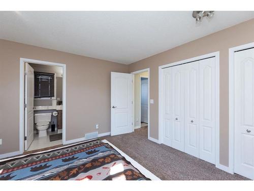 121 Sierra Morena Close Sw, Calgary, AB - Indoor Photo Showing Bedroom