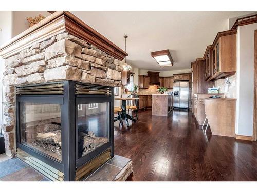 80131 434 Avenue West, Rural Foothills County, AB - Indoor With Fireplace