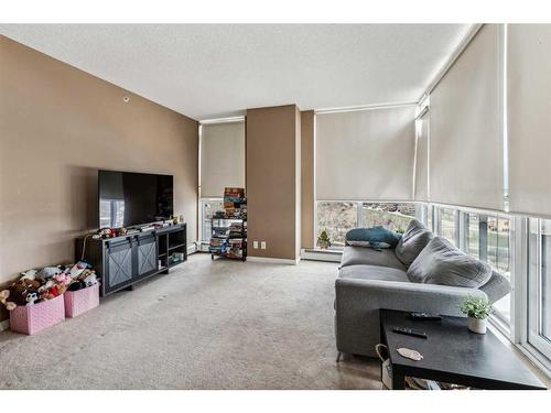 1402-325 3 Street Se, Calgary, AB - Indoor Photo Showing Living Room