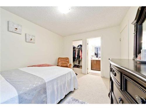 C301-4455 Greenview Drive Ne, Calgary, AB - Indoor Photo Showing Bedroom