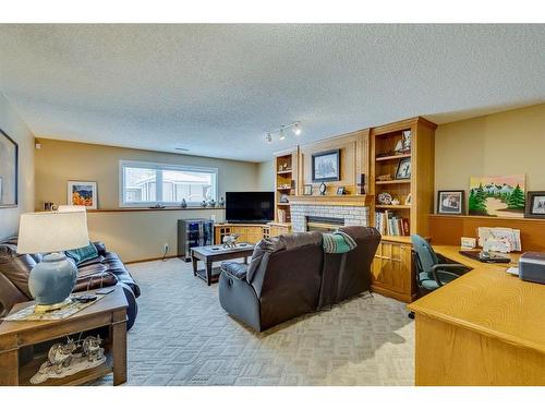 32 Sunmeadows Place Se, Calgary, AB - Indoor With Fireplace