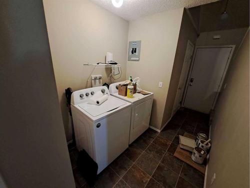 3 Alberta Avenue, Okotoks, AB - Indoor Photo Showing Laundry Room