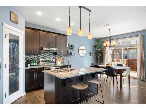 48 Sage Bluff Green Nw, Calgary, AB - Indoor Photo Showing Kitchen With Upgraded Kitchen