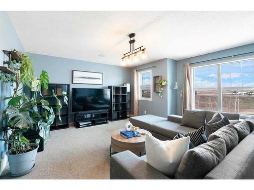 48 Sage Bluff Green Nw, Calgary, AB - Indoor Photo Showing Living Room