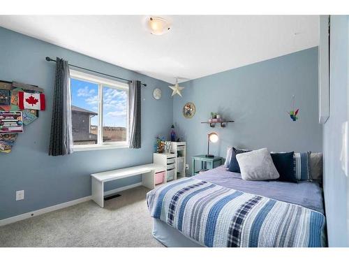 48 Sage Bluff Green Nw, Calgary, AB - Indoor Photo Showing Bedroom