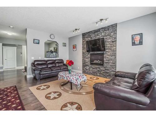350 Nolan Hill Drive Nw, Calgary, AB - Indoor Photo Showing Living Room With Fireplace
