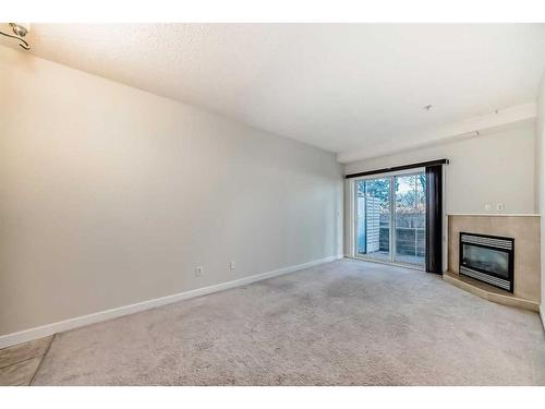 320-1800 14A Street Sw, Calgary, AB - Indoor With Fireplace