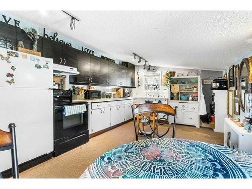 1238 Osler Street, Carstairs, AB - Indoor Photo Showing Kitchen