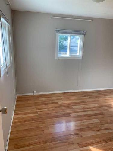 1233 Downie Street, Carstairs, AB - Indoor Photo Showing Other Room