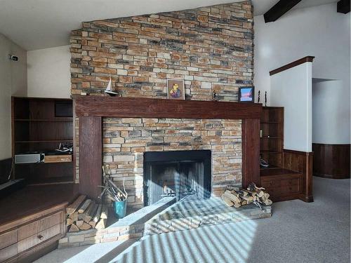 16117 Highway 552 Highway West, Rural Foothills County, AB - Indoor Photo Showing Living Room With Fireplace
