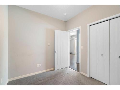 421-4350 Seton Drive Se, Calgary, AB - Indoor Photo Showing Other Room