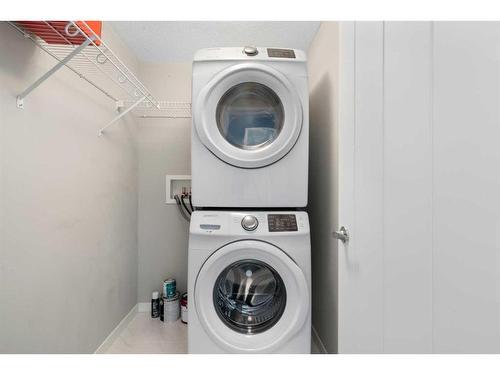 421-4350 Seton Drive Se, Calgary, AB - Indoor Photo Showing Laundry Room