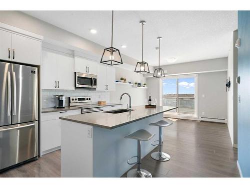 421-4350 Seton Drive Se, Calgary, AB - Indoor Photo Showing Kitchen With Upgraded Kitchen