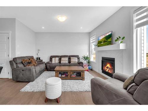 3605 Cornerstone Boulevard Ne, Calgary, AB - Indoor Photo Showing Living Room With Fireplace