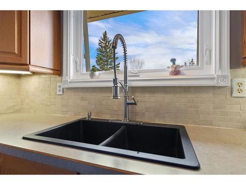 259 Sandstone Road Nw, Calgary, AB - Indoor Photo Showing Kitchen With Double Sink