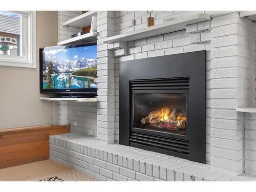 259 Sandstone Road Nw, Calgary, AB - Indoor With Fireplace