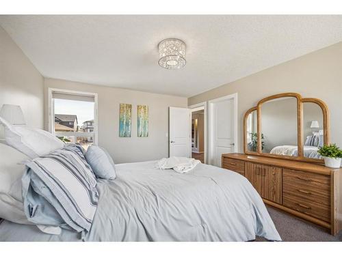 148 Hillcrest Drive Sw, Airdrie, AB - Indoor Photo Showing Bedroom
