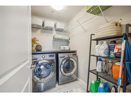 148 Hillcrest Drive Sw, Airdrie, AB - Indoor Photo Showing Laundry Room