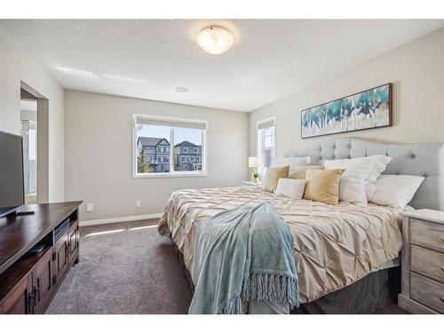 148 Hillcrest Drive Sw, Airdrie, AB - Indoor Photo Showing Bedroom