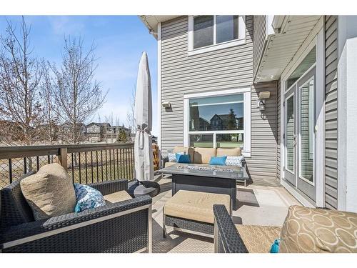 148 Hillcrest Drive Sw, Airdrie, AB - Outdoor With Deck Patio Veranda