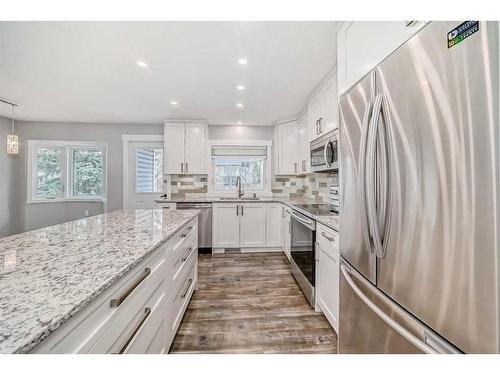65 Millrise Lane Sw, Calgary, AB - Indoor Photo Showing Kitchen With Stainless Steel Kitchen With Upgraded Kitchen
