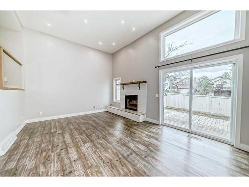 65 Millrise Lane Sw, Calgary, AB - Indoor With Fireplace