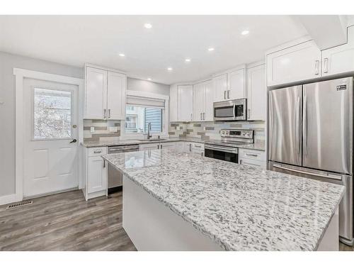 65 Millrise Lane Sw, Calgary, AB - Indoor Photo Showing Kitchen With Stainless Steel Kitchen With Upgraded Kitchen