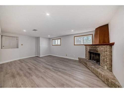 2044 Pinetree Crescent Ne, Calgary, AB - Indoor With Fireplace