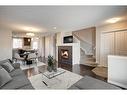 64 Auburn Meadows Boulevard Se, Calgary, AB  - Indoor Photo Showing Living Room With Fireplace 