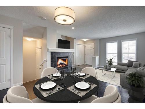 64 Auburn Meadows Boulevard Se, Calgary, AB - Indoor Photo Showing Living Room With Fireplace