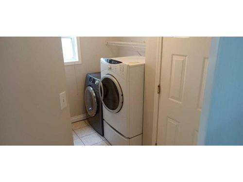 90 Arbour Stone Crescent Nw, Calgary, AB - Indoor Photo Showing Laundry Room