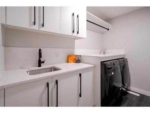112 Carringsby Manor Nw, Calgary, AB - Indoor Photo Showing Laundry Room