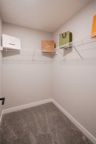 112 Carringsby Manor Nw, Calgary, AB - Indoor With Storage