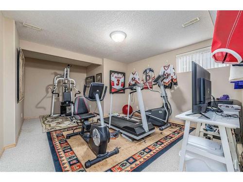 13 Panorama Hills Manor Nw, Calgary, AB - Indoor Photo Showing Gym Room