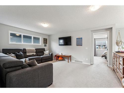 74 Buckskin Way, Cochrane, AB - Indoor Photo Showing Living Room