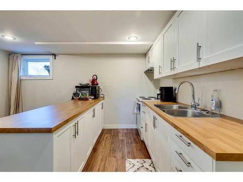 5113 56 Avenue, Olds, AB - Indoor Photo Showing Kitchen With Double Sink