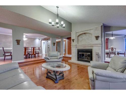 305 East Chestermere Drive, Chestermere, AB - Indoor Photo Showing Living Room With Fireplace