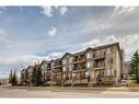 1-21 Mckenzie Towne Gate Se, Calgary, AB  - Outdoor With Balcony With Facade 