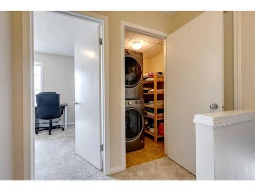 1-21 Mckenzie Towne Gate Se, Calgary, AB - Indoor Photo Showing Laundry Room