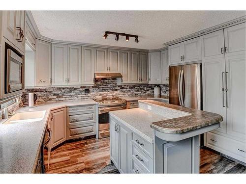 135 Ranch Estates Place Nw, Calgary, AB - Indoor Photo Showing Kitchen With Upgraded Kitchen