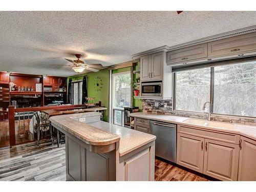 135 Ranch Estates Place Nw, Calgary, AB - Indoor Photo Showing Kitchen With Double Sink