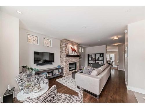 1809 Broadview Road Nw, Calgary, AB - Indoor Photo Showing Living Room With Fireplace