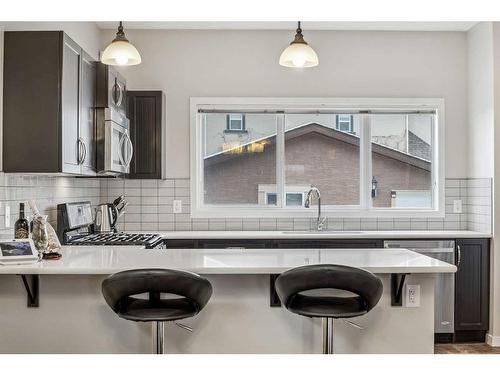 208 Mahogany Grove Se, Calgary, AB - Indoor Photo Showing Kitchen With Upgraded Kitchen