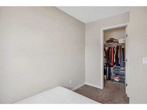 208 Mahogany Grove Se, Calgary, AB - Indoor Photo Showing Bedroom