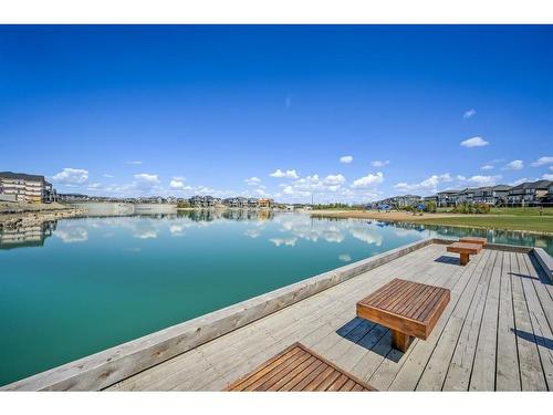 208 Mahogany Grove Se, Calgary, AB - Outdoor With Body Of Water With Deck Patio Veranda With View
